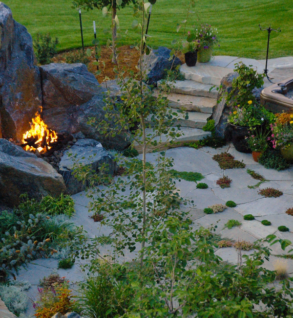 Let the shape of the boulders and your landscape’s style dictate the arrangement